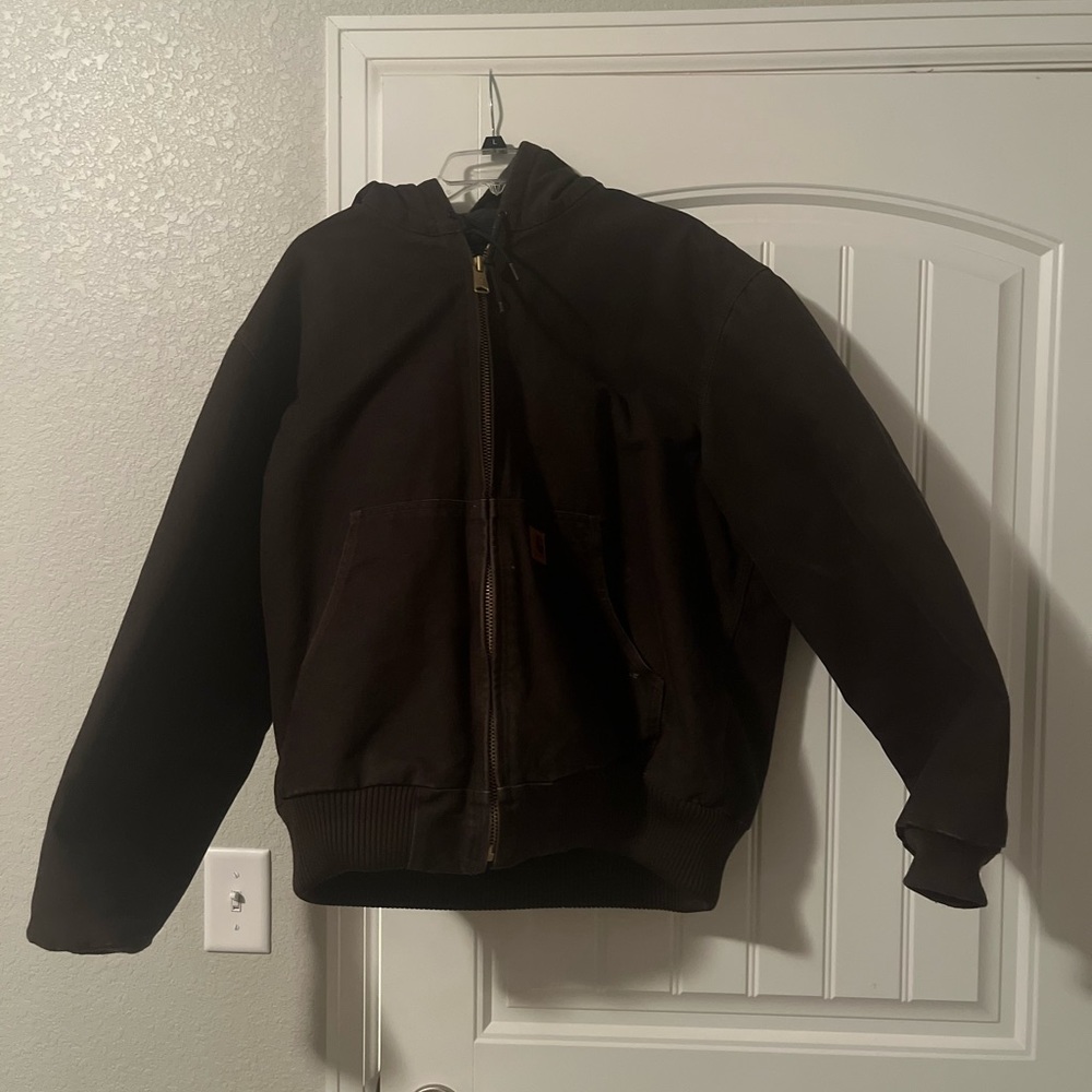 Dark brown Carhartt size large hooded jacket.